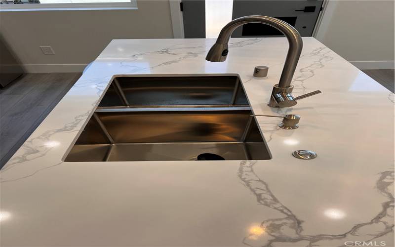 Quartz counter tops and deep stainless kitchen sink