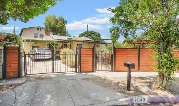 Privacy fence surrounds the front.