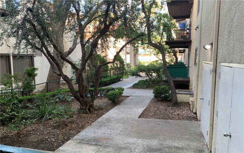 Nice path to pool recreation room gym and tennis courts