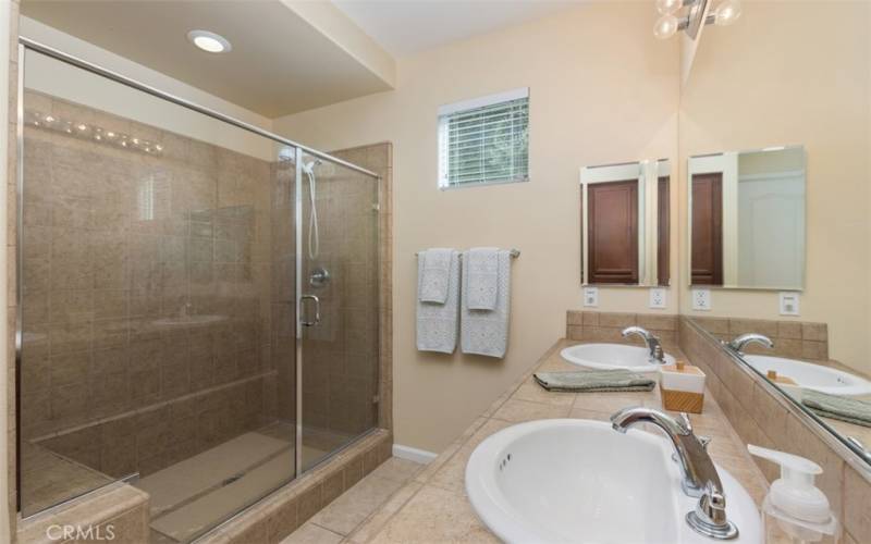 Large walk in shower, vanity with dual sinks