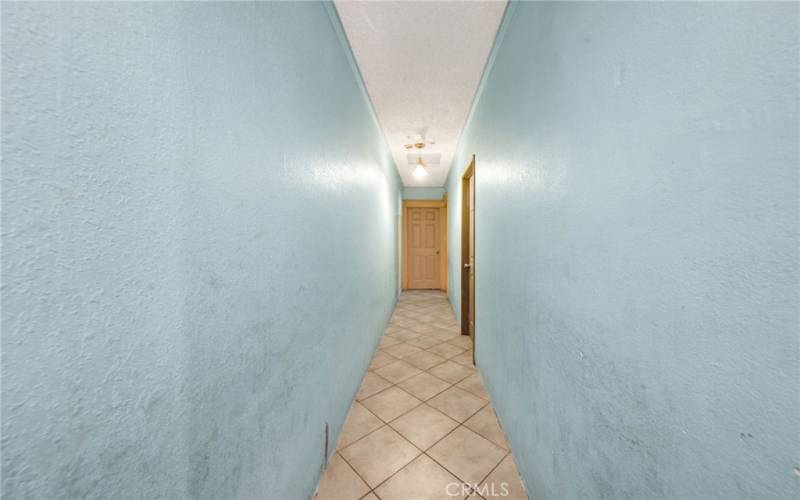 Hallway to bedrooms and bathroom