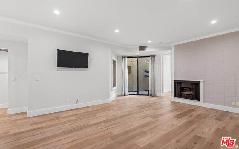 Living Room with Private Outdoor Patio Doors In Center