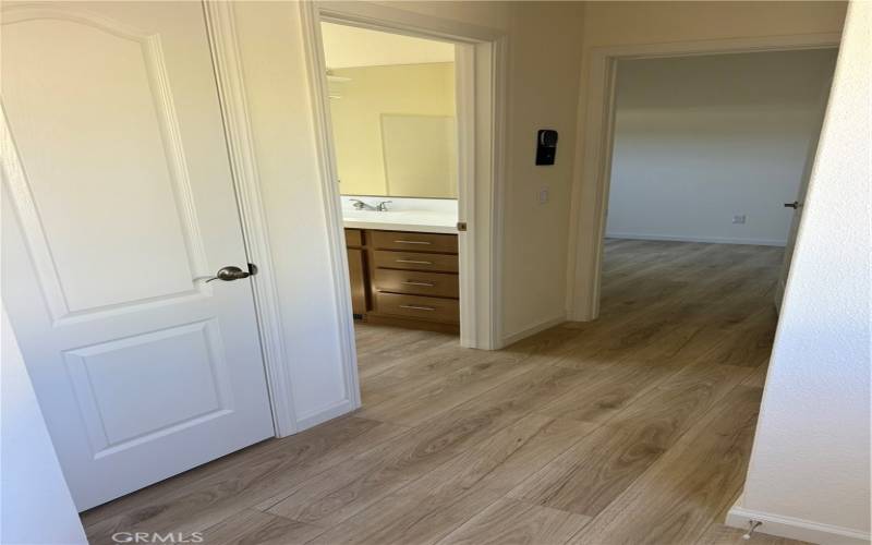 Hallway to bedrooms, bath and laundry area