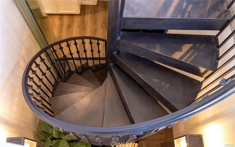 Spiral staircase to 3rd floor entertaining space