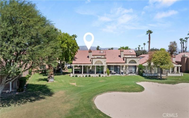 View of the back of the home from the golf course.