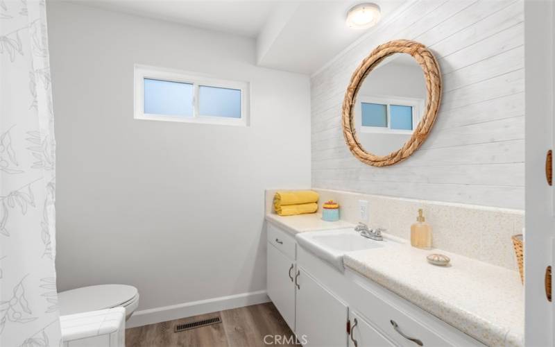 Main full bathroom  with shower and bathtub.