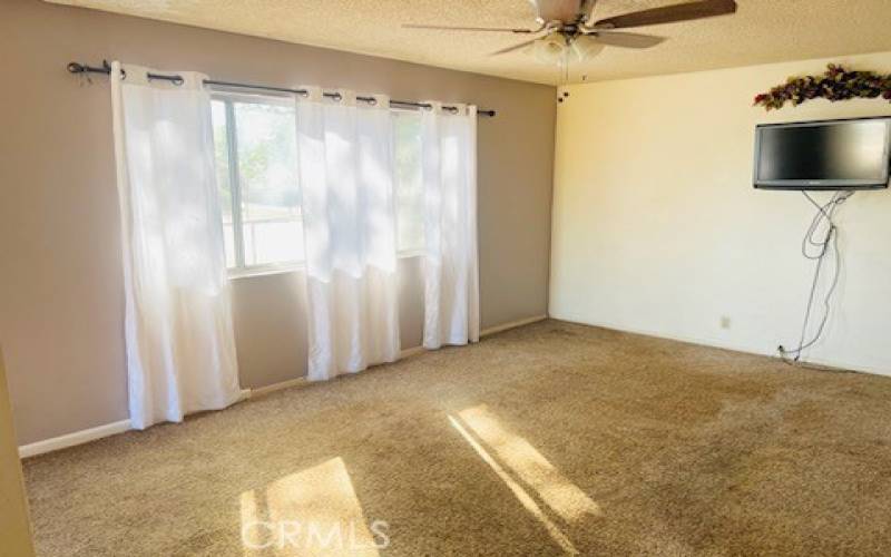 Spacious Living Room with clean carpets