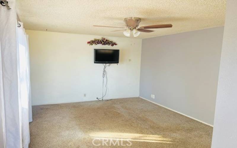 Spacious Living Room with clean carpets