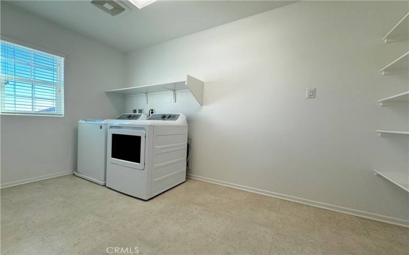 Upstairs Laundry Room With Built-In Shelving