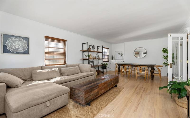 Living and dining room. Refinished original flooring.