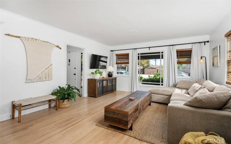 Living room with large windows to front garden