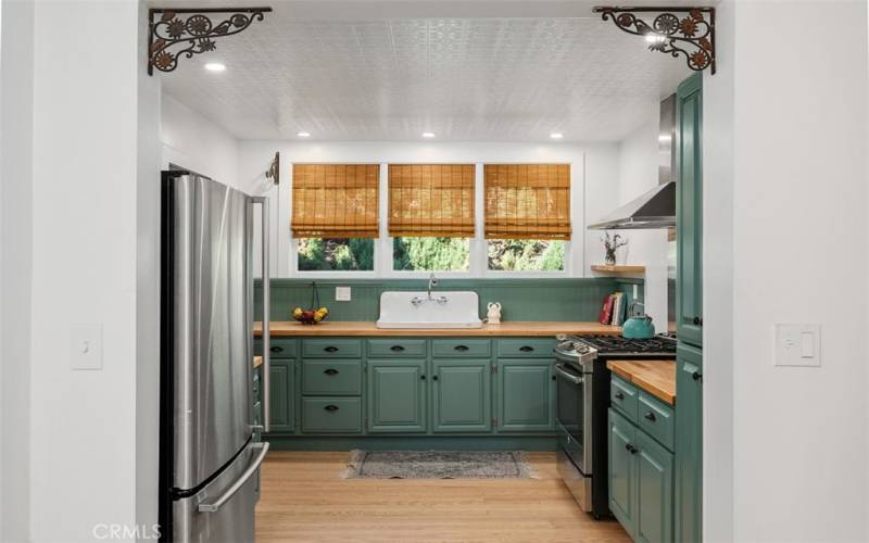 Open kitchen with stainless steel appliances