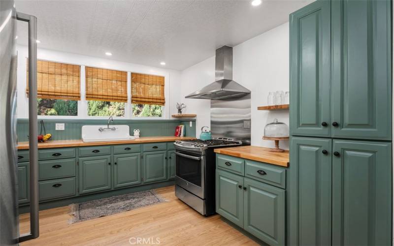 Open kitchen with stainless steel appliances