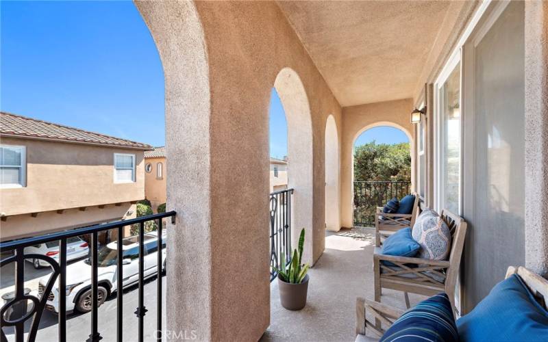 Balcony off of primary bedroom and living room