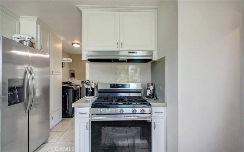 Indoor laundry area near kitchen