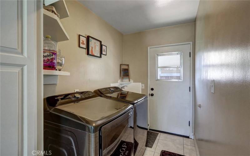 Laundry Room with door to backyard