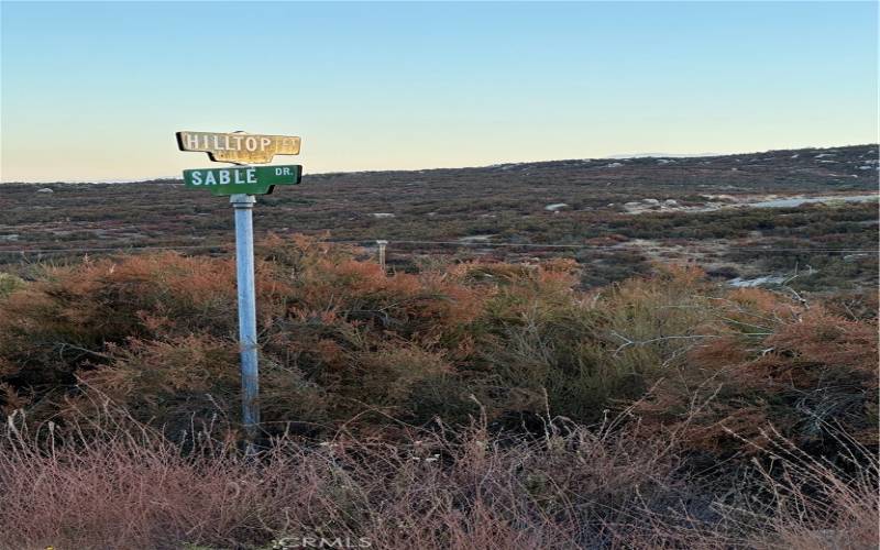 Street Sign in front of parcel.