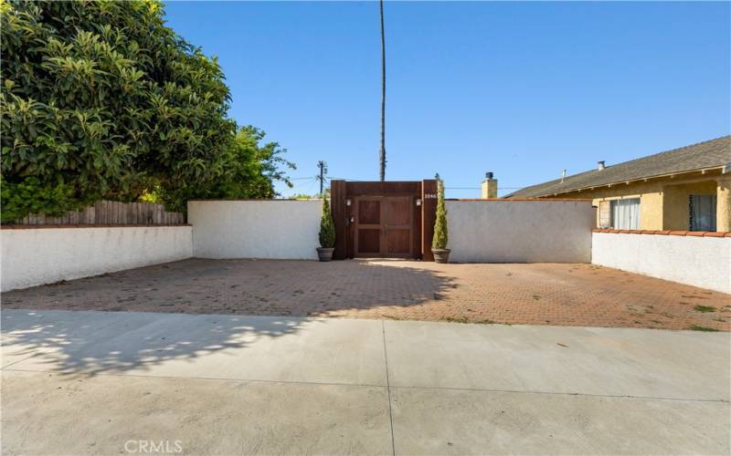 Front gate entry with ample parking.