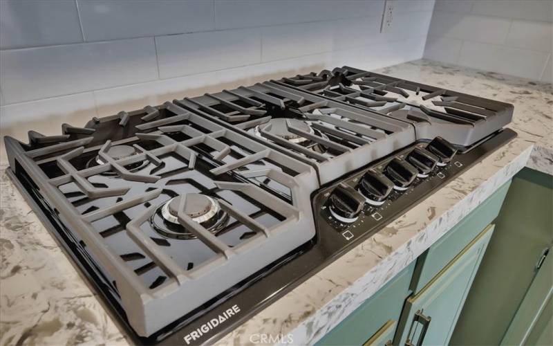 Newer, never used, Frigidaire stove top