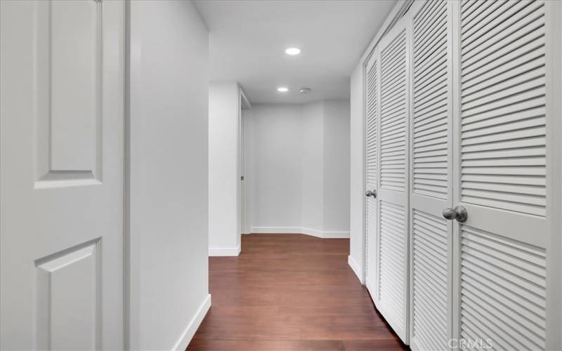 Entry area with storage cabinet and W/D closet