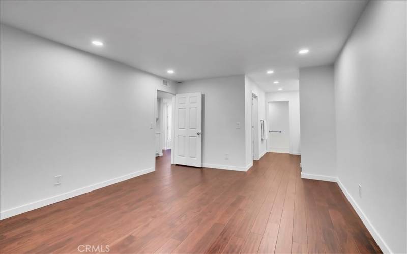 In primary bedroom looking towards bathroom and closet