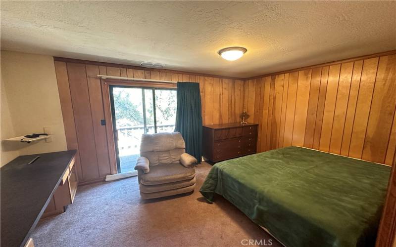 Back Bedroom includes All Furniture and Built-In Custom Computer Desk. Slider to Deck