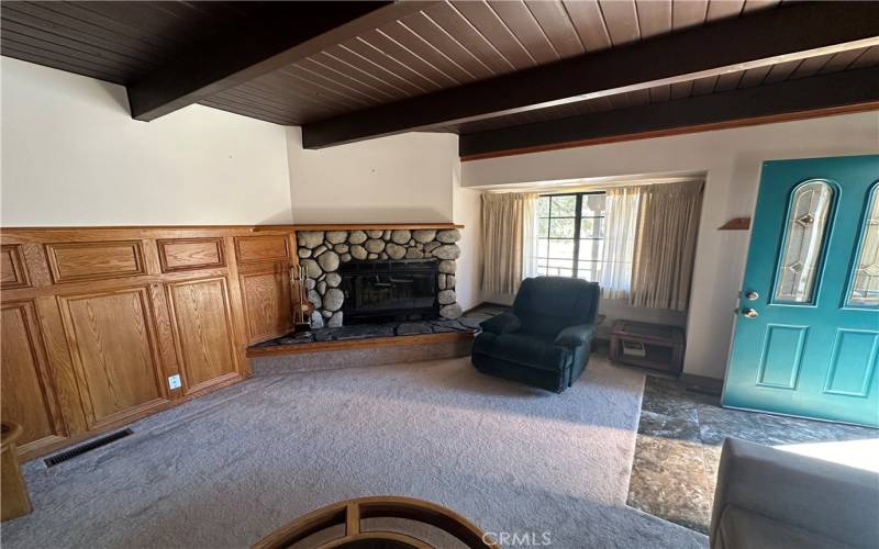 Inviting Fireplace and Beautiful Hand Crafted Wainscotting