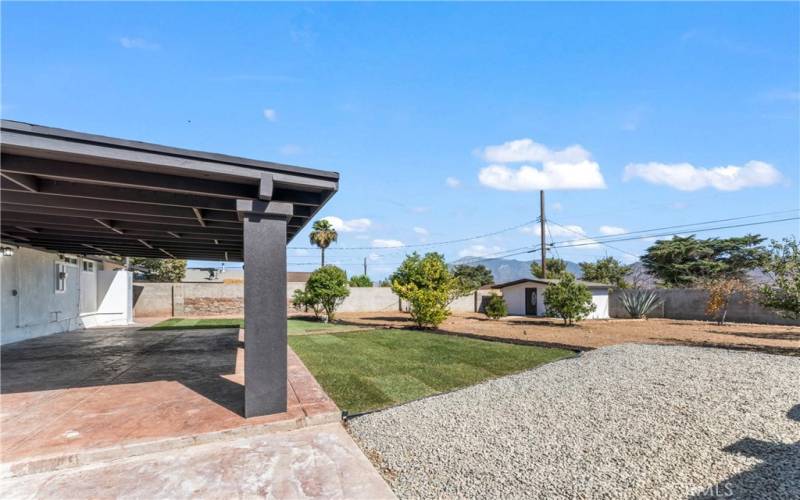 Cover patio overlooking the back yard.