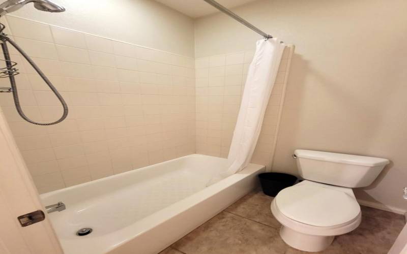 GUEST BATHROOM WITH TUB AND SHOWER