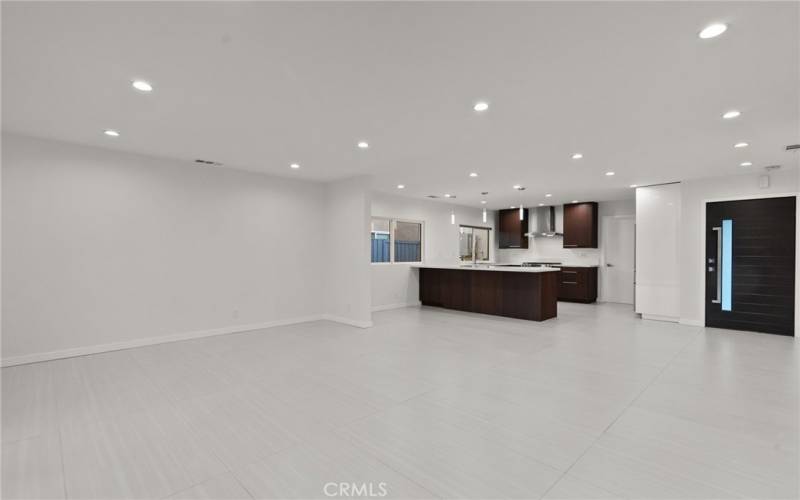 Living room facing kitchen area 1