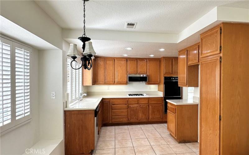 Kitchen corner adjoins both family room and dining room on the other side.