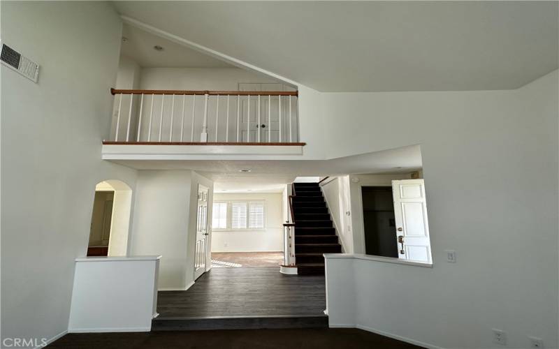 Looking up at 2nd story hall from the living room