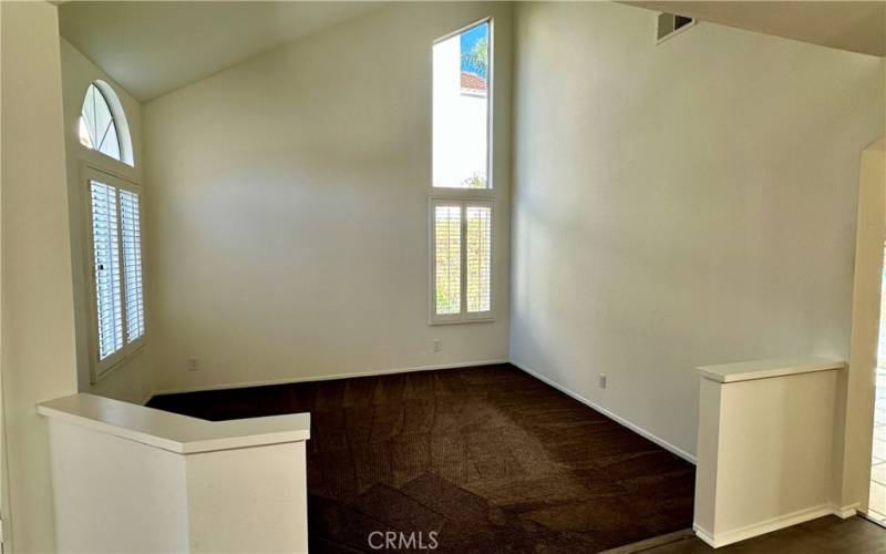 Living room with high cathedral ceilings...