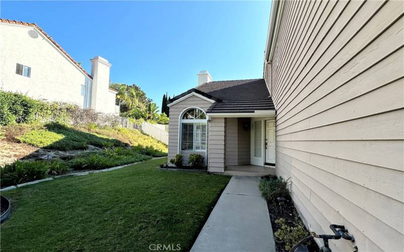 Manicured front lawn, well maintained