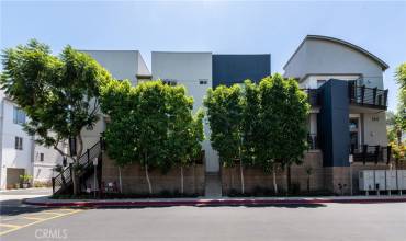 Looking at the privacy hedges in front of this fabulous Fusion home!