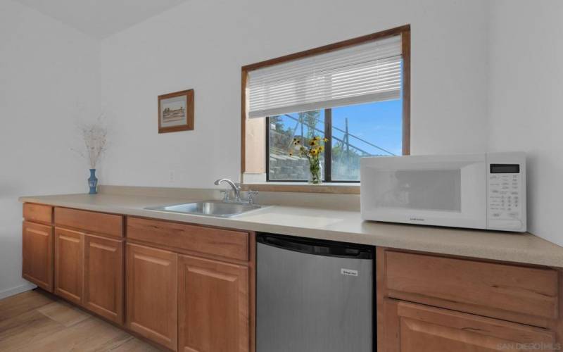 Guest room with separate entry and coffee bar.