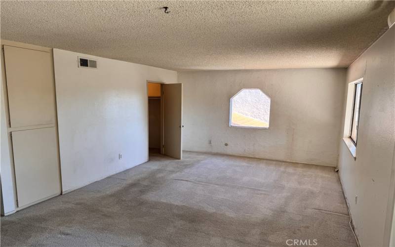 Bedroom 3, Upstairs Suite with walk-in closet. Builder option was to spit this into 2 bedrooms