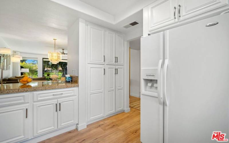 Granite tile counters. Not shown but there is a brand new stainless steel refrigerator just installed