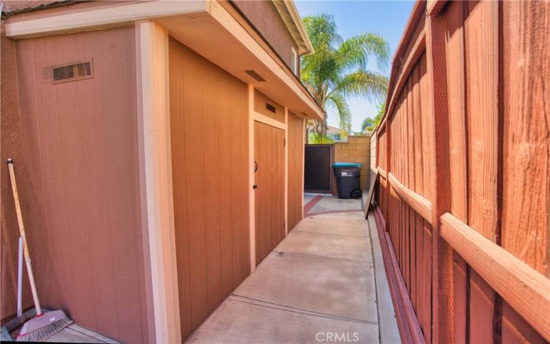 Large storage shed on side yard