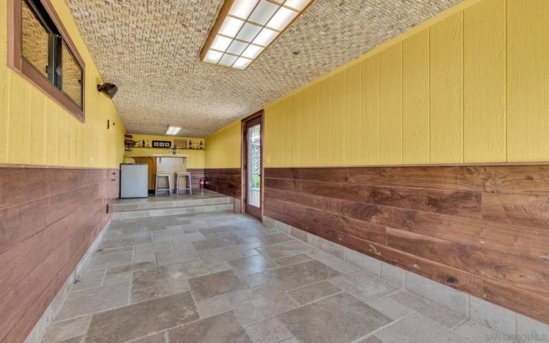 The storage/wine room is a work of art, the ceiling is lined with individually placed wine corks.