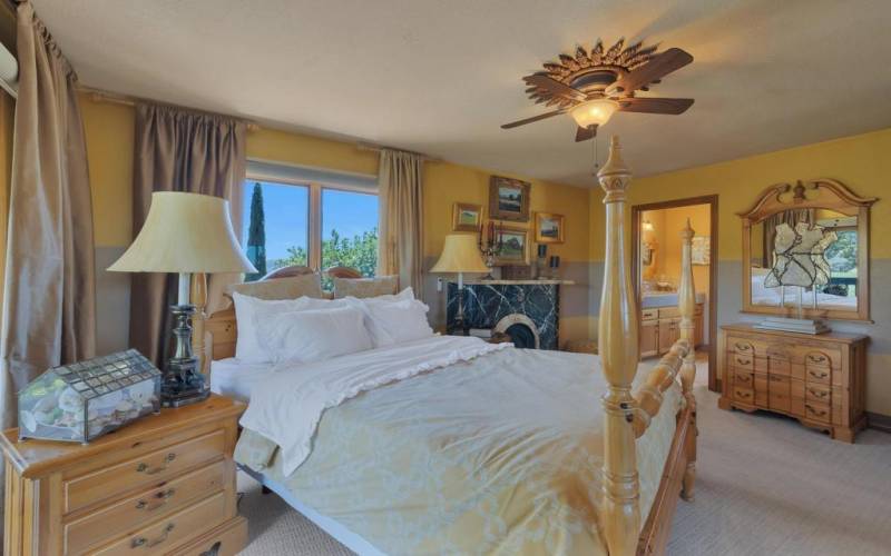 The charming suite is warm and bright with views of the surrounding landscape.