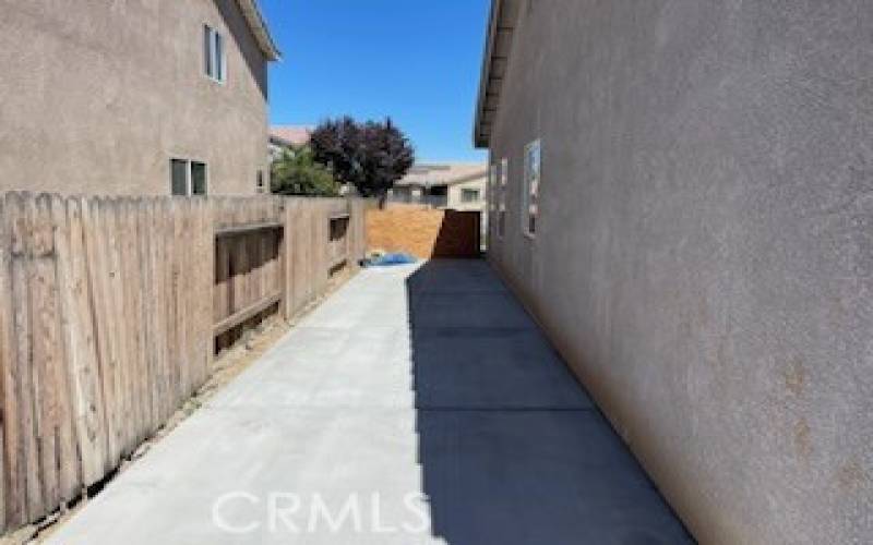 Outside backyard left side of house at 14615 Tucson St, Victorville CA 92394