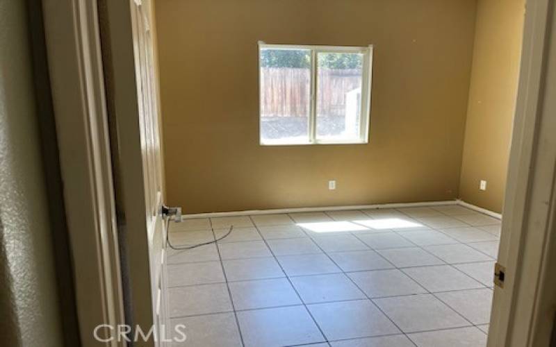 Bedroom 2 by family room in 14615 Tucson St, Victorville CA 92394