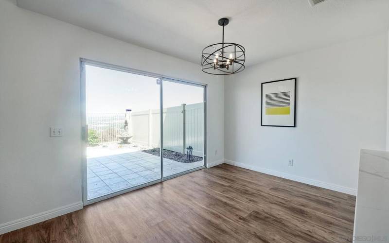 Dining area with slider to back patio