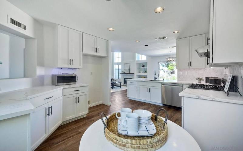 View from small dinette area tucked away in corner of the kitchen with views to the front yard