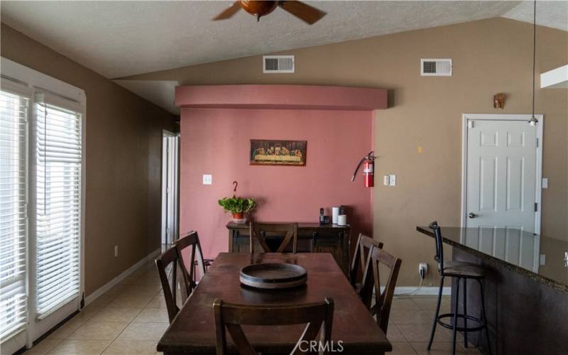 dinning area hall way on left leads to 2 more bedrooms