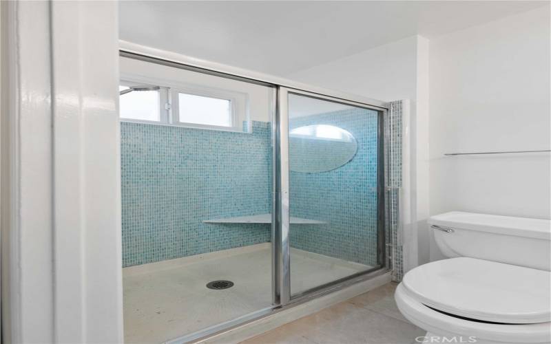 3/4 bath offers Mosaic Tiled Stall Shower with glass enclosure