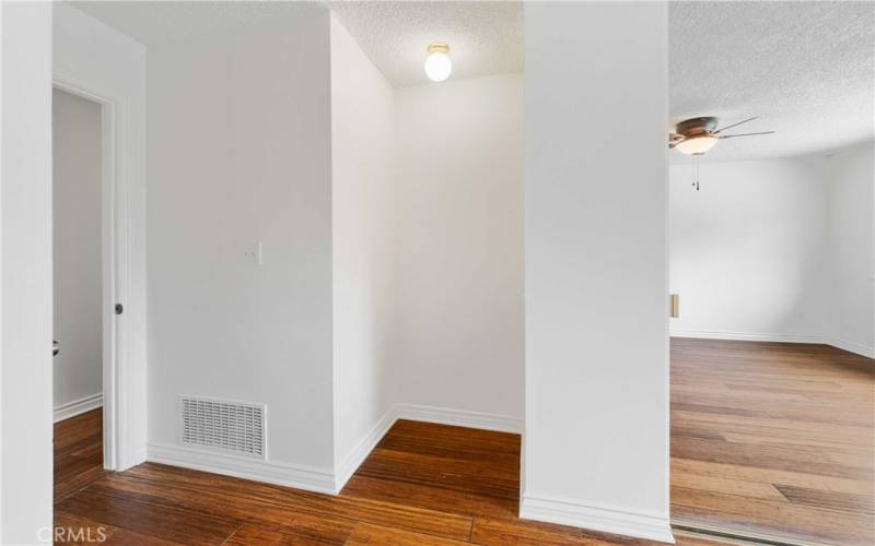 Primary bedroom has a great nook for a dresser or extra storage shelves