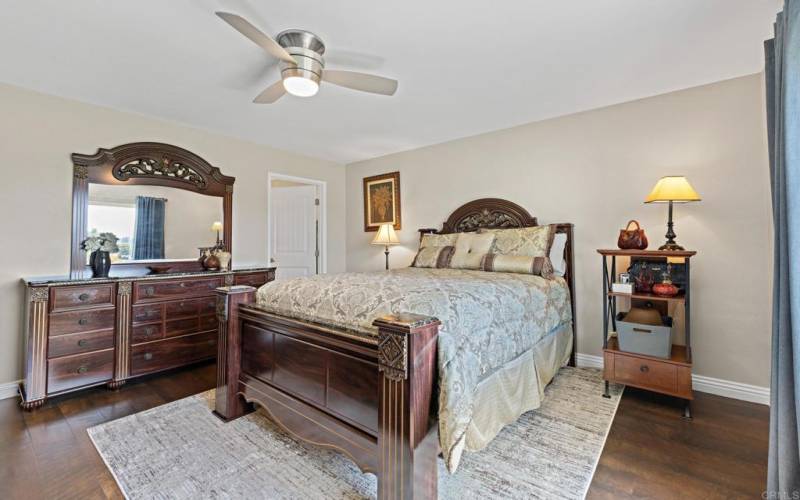 Primary bedroom with direct view of the golf course