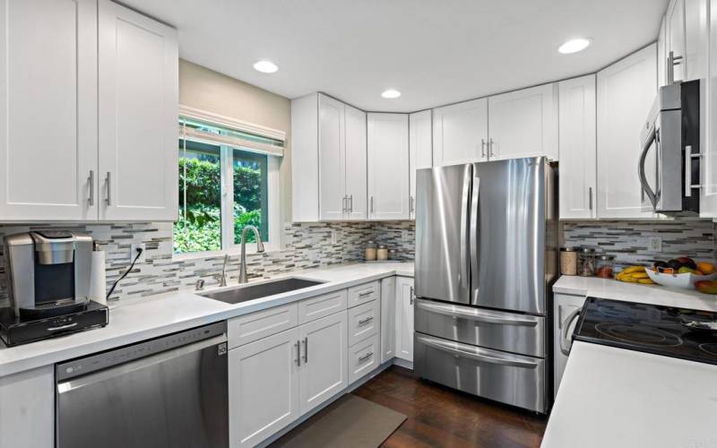 Quartz counter tops, farm sink and newer appliances